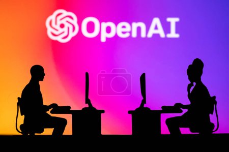 Photo for NEW YORK, USA, 25. JANUARY 2023: Open AI Web Developers at Work. Man and woman software engineers sitting in open office. Logo of Open AI in background. Brainstorm, Artificial Intelligence. Teamwork - Royalty Free Image