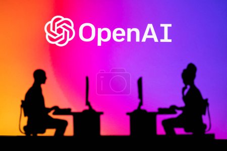 Photo for NEW YORK, USA, 25. JANUARY 2023: Collaborating for the Future: A Silhouette of OpenAI Web Developers at Work. Brainstorm, Artificial Intelligence. Teamwork - Royalty Free Image