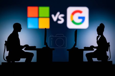 Téléchargez les photos : USA, LOS ANGELES. JANUARY 30, 2023: AI Battle, : Google vs Microsoft in the Race to Revolutionize Software. Silhouette of two software engineers working with Artificial intelligence - en image libre de droit