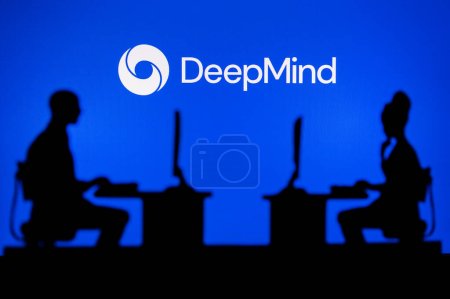 Photo for JAPAN, TOKYO. JANUARY 30, 2023: DeepMind from Google. A Glimpse into the Tech World: Silhouette of Software Developers with Company Logo Behind Them - Royalty Free Image