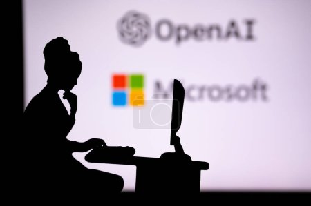 Photo for USA, NEW YORK CITY, JANUARY 30, 2023: Open AI. Silhouette of a Strong Female Software Developer with Company Logo - Royalty Free Image