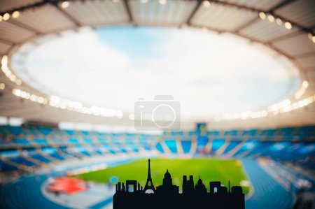 Foto de City of Lights and Sports: Silhouette of Paris Showcasing Landmarks, Set Against a Contemporary Stadium (en inglés). Una imagen cautivadora para el verano de 2024 en París - Imagen libre de derechos