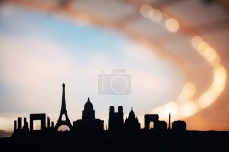 Téléchargez les photos : Paris dévoilé : une silhouette captivante de monuments emblématiques incarnant l'esprit des Jeux sportifs de 2024. Stade en arrière-plan, couleurs chaudes et espace de montage blanc - en image libre de droit