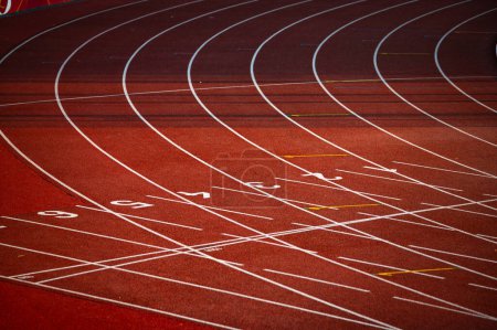 Photo for Red Track with Precise White Lines and Sequential Numbers: A Visual Representation of Athletic Preparation and Precision - Track and Field Illustration Photo for Worlds in Budapest and Games in Paris - Royalty Free Image