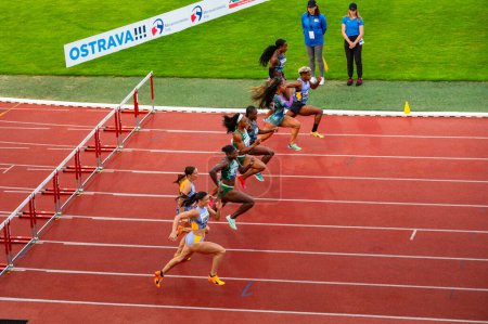 Photo for OSTRAVA, CZECHIA, JUNE 27, 2023: Female Sprinters Race the 100m Hurdles Track in Track and Field Meet for Worlds in Budapest and Games in Paris - Royalty Free Image