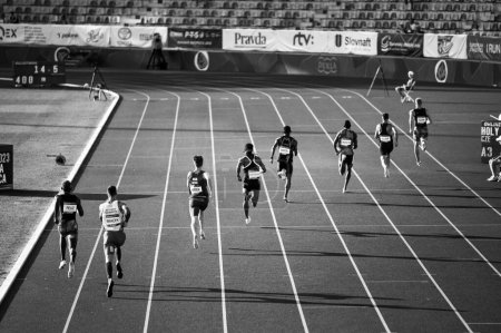 Photo for B. BYSTRICA, SLOVAKIA, JULY 20, 2023: Black and Wgite Track and Field photo. Men Sprint race - Royalty Free Image