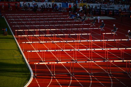 Photo for B. BYSTRICA, SLOVAKIA, JULY 20, 2023: Track and Field Photo. Hurdles Positioned in Anticipation of Track and Field Competition on the Stage for Worlds in Budapest and Games in Paris - Royalty Free Image