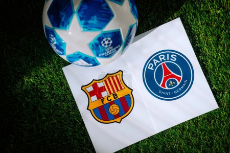 Photo for PARIS, FRANCE, MARCH. 16. 2024: Paris Saint-Germain (FRA) vs FC Barcelona (ESP). Quarter Finals of football UEFA Champions League 2024 in Europe. Logo of teams and official soccer ball on green grass - Royalty Free Image