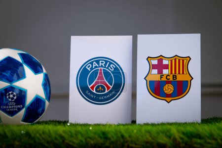 Photo for PARIS, FRANCE, MARCH. 16. 2024: Paris Saint-Germain (FRA) vs FC Barcelona (ESP. Quarter Finals of football UEFA Champions League 2024 in Europe. Logo of teams and official soccer ball on green grass - Royalty Free Image