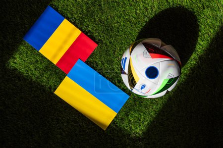 Photo for LEIPZIG, GERMANY, APRIL 17, 2024: Romania vs Ukraine, Euro 2024 Group E football match at Munich Football Arena, Munich, 17 June 2024, official ball on green grass - Royalty Free Image