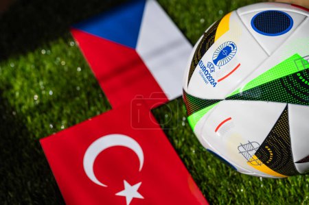 Photo for BERLIN, GERMANY, APRIL 17, 2024: Czech Republic vs Turkey, Euro 2024 Group F football match at Volksparkstadion, Hamburg, 26 June 2024, official ball on green grass - Royalty Free Image
