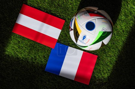 Photo for HAMBURG, GERMANY, APRIL 17, 2024, Austria vs France, Euro 2024 Group D football match at Dsseldorf Arena, Dsseldorf, 17 June 2024, official ball on green grass - Royalty Free Image