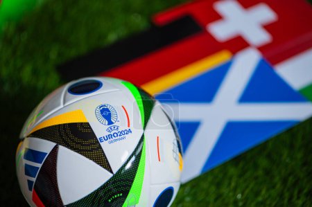 Photo for BERLIN, GERMANY, APRIL 17, 2024: Group A at Europe football tournament in Germany in 2024. Flags of Germany, Scotland, Hungary, Switzerland and soccer ball on green grass - Royalty Free Image
