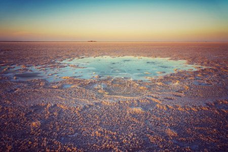 Photo for Bubbling pond in the salt plains of Asale Lake in the Danakil Depression in Ethiopia in Africa. - Royalty Free Image