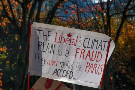 Photo for Vancouver, Canada - October 25,2019: A sign that reads 'The Liberal's Climate Plan is a Fraud' as part of the climate strike in front of the Vancouver Art Gallery - Royalty Free Image