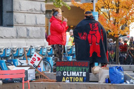 Photo for Vancouver, Canada - October 25,2019: People holding a sign that reads 'Indigenous Sovereignty is Climate Action' as part of the climate strike in front of the Vancouver Art Gallery - Royalty Free Image