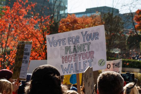 Photo for Vancouver, Canada - October 25,2019: A sign that reads 'Vote for your planet not your wallet' as part of the climate strike in front of the Vancouver Art Gallery - Royalty Free Image