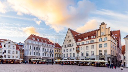 Photo for Tallinn, Estonia - October 19, 2022: Cityscape with restaurants at town hall market square in the center of old medieval town of Tallinn in Estonia Unesco world heritage site - Royalty Free Image
