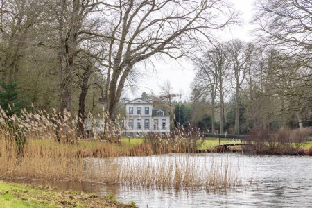 Photo for Heerenveen, The Netherlands - Februari 17, 2023: Estate and mansion Oranjewoud in Heerenveen Friesland province in The Netherlands - Royalty Free Image