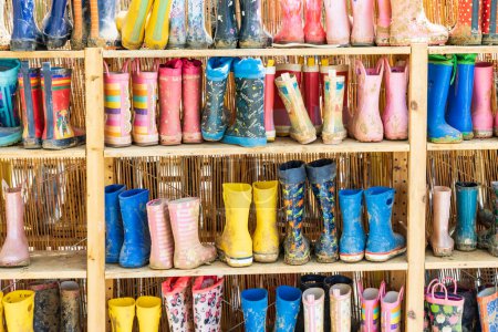 Photo for Colorful childeren rain boots from childcare at American Farm School in Thessaloniki Central Macedonia in Greece - Royalty Free Image