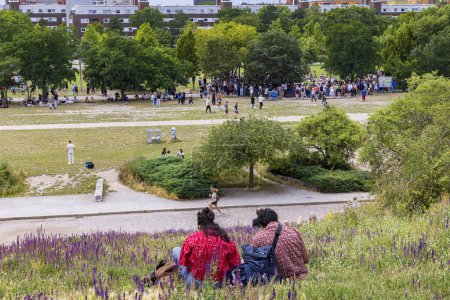 Photo for Berlin, Germany - July 23, 2023: People enjoying the view from the hill in Mauerpark in Berlins Prenzlauer Berg district in Berlin in Germany. - Royalty Free Image