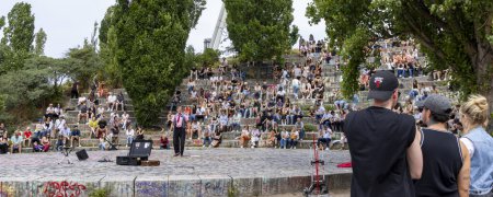 Photo for Berlin, Germany - July 23, 2023: Entertainmant in amphi theater in Mauerpark in Berlins Prenzlauer Berg district in Berlin in Germany. - Royalty Free Image