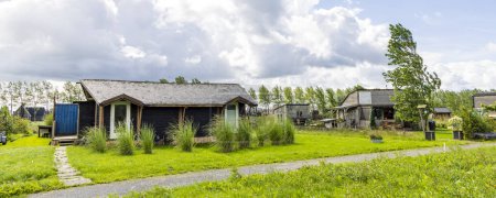 Photo for Ten Boer, The Netherlands - August 8, 2023: Tiny house area Woldwijk in Ten Boer municipality Midden-Groningen in Groningen province in The Netherlands - Royalty Free Image