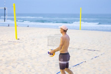 Photo for Surfers Paradise QLD Australia : 9 March 2023: Beach volleyball competition on the sand at Main Beach - Royalty Free Image