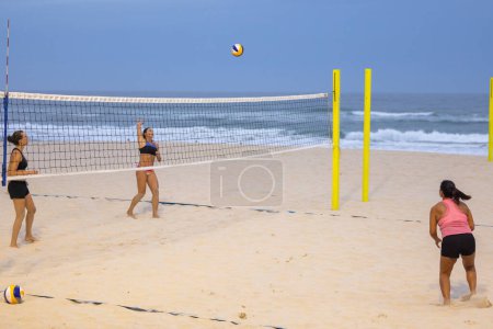 Photo for Surfers Paradise QLD Australia : 9 March 2023: Beach volleyball competition on the sand at Main Beach - Royalty Free Image