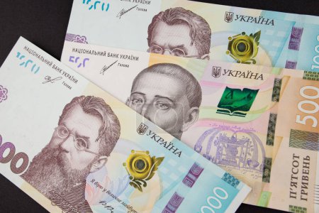 Ukrainian money. Different hryvnia. Financial concept.