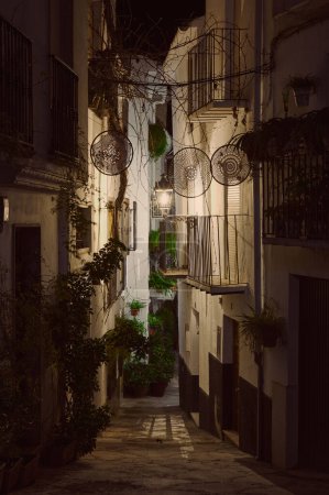 Calle Adentro at night. The most beautiful and famous street in the city of Quesada in the province of Jaen. Travel and tourism concept
