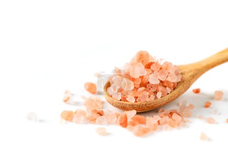 Photo for Himalayan Rock pink Salt on wood spoon isolated on white background - Royalty Free Image