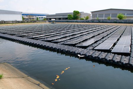Photo for Solar panels on a wastewater treatment plant.renewable energy concept - Royalty Free Image