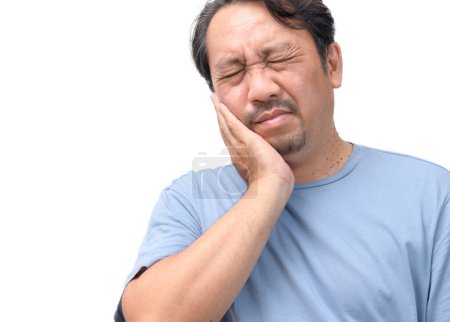 Handsome middle age senior man wearing blue shirt isolated background touching mouth with hand with painful expression because of toothache or dental illness on teeth. Dentist concept.