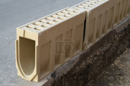 Monolithic channel drainage system. Water collection shaft made of polymer concret