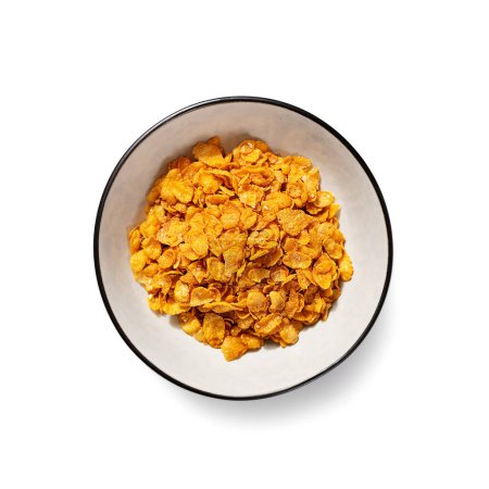 Téléchargez les photos : Bowl of dry cornflakes isolated on white. top view - en image libre de droit