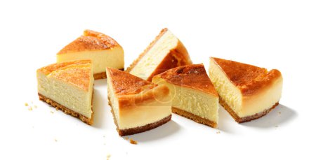 Photo for Slices of fresh baked homemade lemon cheesecake. isolated on white background - Royalty Free Image