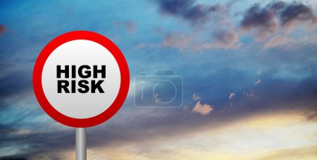 high risk sign on sky background