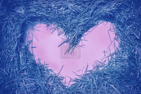 Photo for Pink heart on cutting fresh grass from lawn - Royalty Free Image