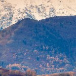 Mountains landscape in autumn. View of mountain ridge covered with snow during sunset, Pyrenees, Andorra, Europe. Horizontal banner
