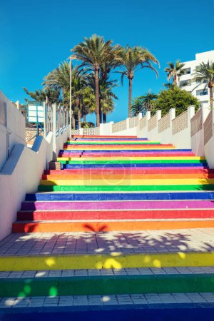 Colorful staircase in the park. The steps are painted in rainbow colors. Nerja, Malaga, Spain