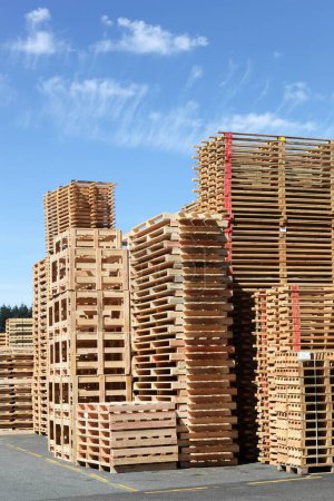 Photo for Stacked wooden pallets or skids - Royalty Free Image