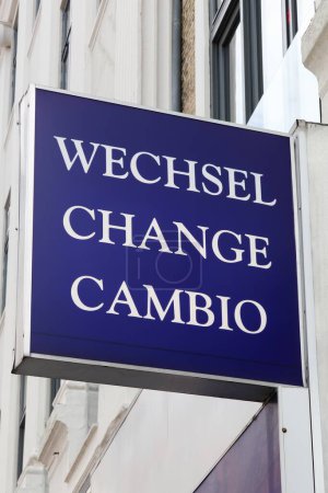 Exchange, wechsel, change, cambio sign on a wall