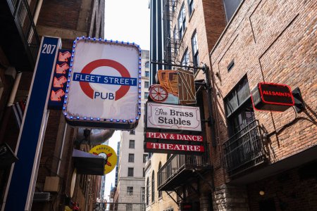 Photo for Nashville, Tennessee USA - May 9, 2022: Popular Printers Alley in the downtown district - Royalty Free Image