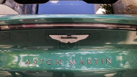 Foto de Miami, Florida USA - February 19, 2023: Rear view of a Aston Martin sports car on display at the public Miami Concours car show in the upscale Design District - Imagen libre de derechos