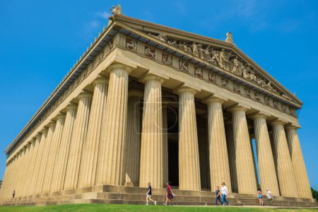 Photo for Nashville, Tennessee USA - May 10, 2022: Tourists enjoying the replica of the Parthenon in the popular Centennial Park in the west end district - Royalty Free Image