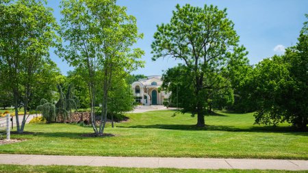 Photo for Nashville, Tennessee USA - May 12, 2023: Beautiful luxury estate home in the upscale Brentwood residential district - Royalty Free Image