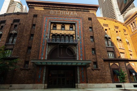 Photo for Chicago, Illinois USA - August 24, 2011: Urban skyline with the vintage Moorish design Bloomingdales Medinah building in the downtown north side on Wabash Avenue - Royalty Free Image