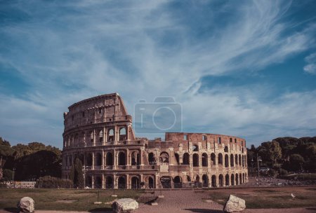 Photo for Colosseum Amphitheater with blue sky. Rome. Italy. - Royalty Free Image