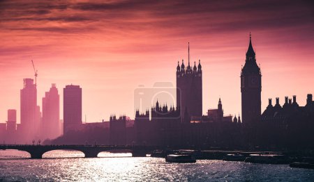 Photo for Big Ben, Westminster and House of Lords at the sunset. London. England. Purple color grading. - Royalty Free Image